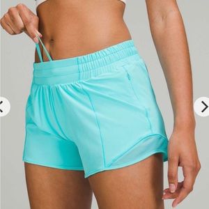 Lululemon Hotty hots low rise 4 inch Electric Turquoise Size 2